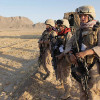 US Marine Female Engagement Team members wait for the signal to begin their patrol in the Helmand Province of Afghanistan in 2009. Photo credit: Julie Jacobson/AP